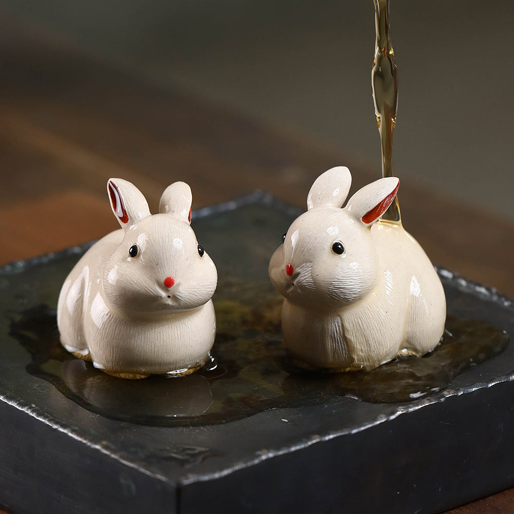Mascottes de thé lapin blanc mignon en argile