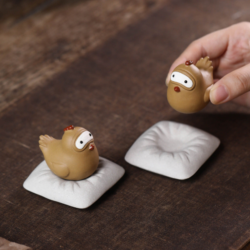 Mascottes de thé coque en argile