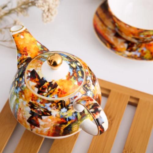Petite Théière solitaire en porcelaine avec tasse assortie « Country Cat » H 16,5 x L 14,5 x P Petite Théière solitaire en porcelaine avec tasse assortie « Country Cat » H 16,5 x L 14,5 x P