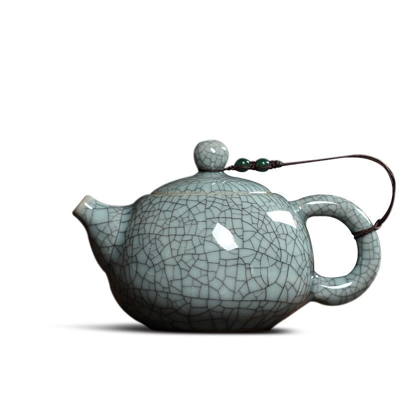 THÉIÈRE EN PORCELAINE VINTAGE
