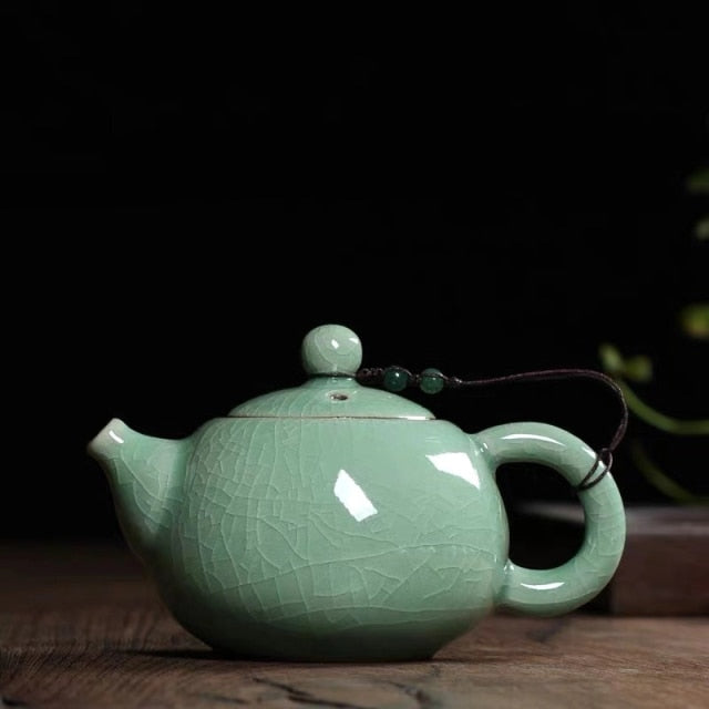 THÉIÈRE EN PORCELAINE VINTAGE