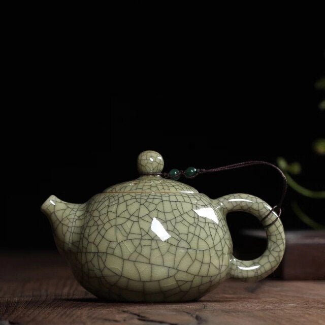 THÉIÈRE EN PORCELAINE VINTAGE