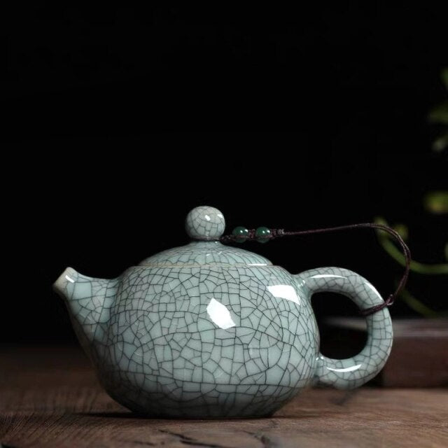 THÉIÈRE EN PORCELAINE VINTAGE
