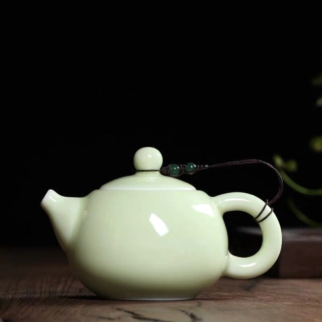THÉIÈRE EN PORCELAINE VINTAGE