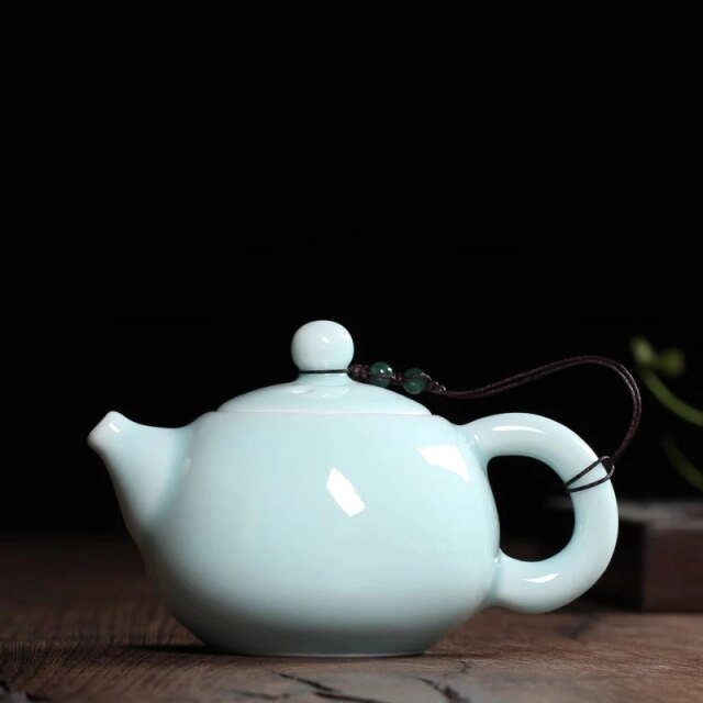 THÉIÈRE EN PORCELAINE VINTAGE