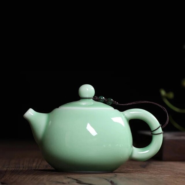THÉIÈRE EN PORCELAINE VINTAGE