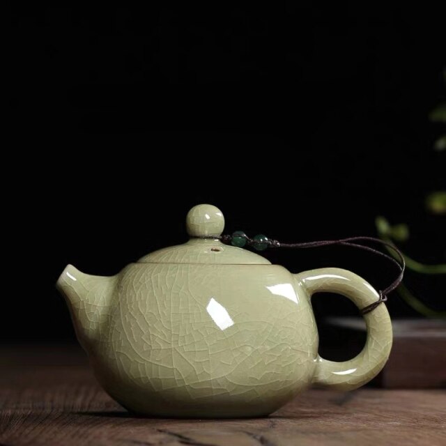 THÉIÈRE EN PORCELAINE VINTAGE