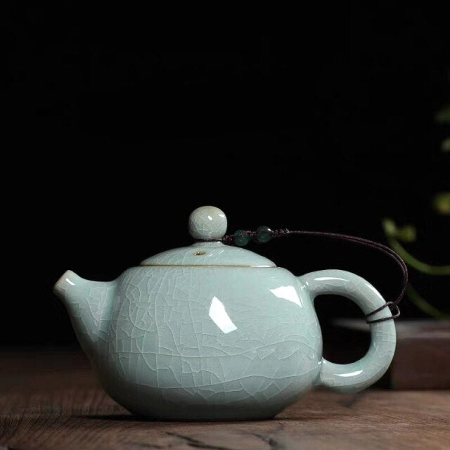 THÉIÈRE EN PORCELAINE VINTAGE