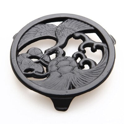 Dessous de théière en fonte gride - rafik ouzou