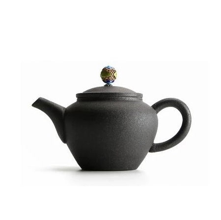 theiere en ceramique avec infuseur
