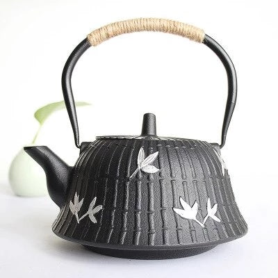 théière chinoise en fonte fleures blanches