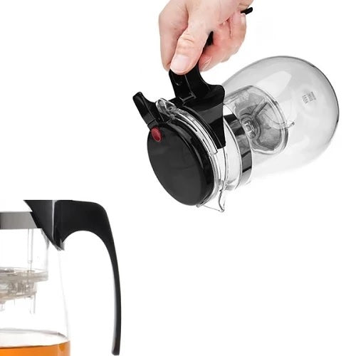 theillere en verre double effet dans une main