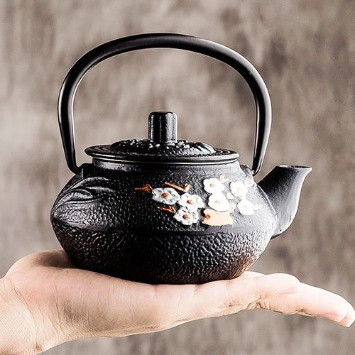 Théière en fonte noire joie de vivre