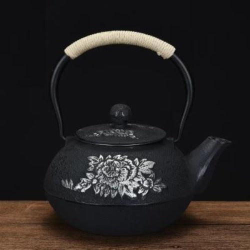 théière en fonte noire fleur d'argent