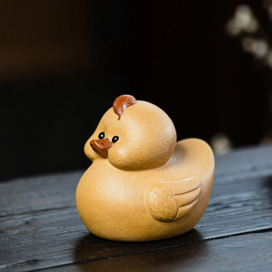 Mascotte de Thé Phénix Doré en Argile