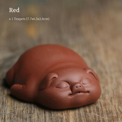 Mascottes de thé cochon en argile