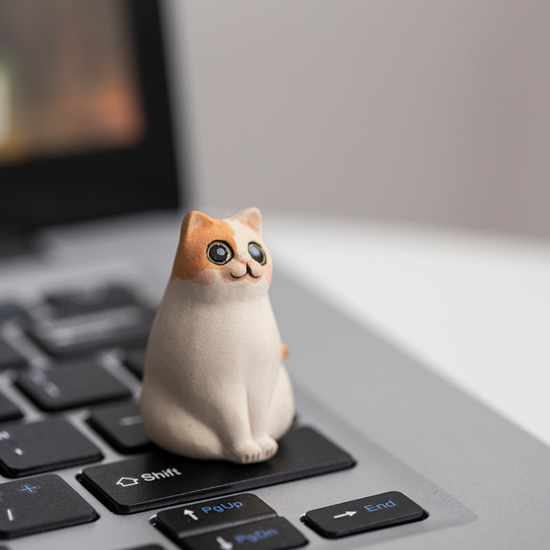 Mascottes de thé chat innocent