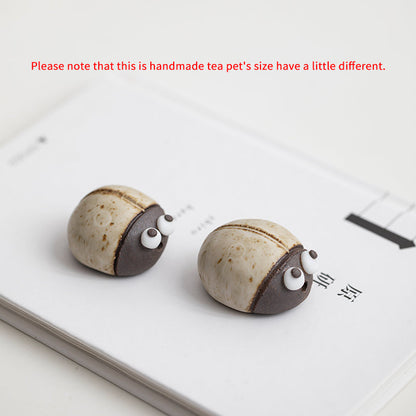 Mascottes de thé coccinelle marron