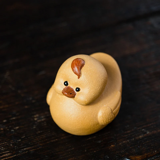 Mascotte de Thé Phénix Doré en Argile