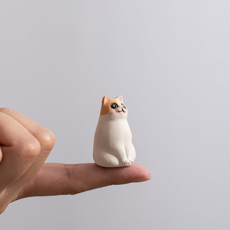 Mascottes de thé chat innocent