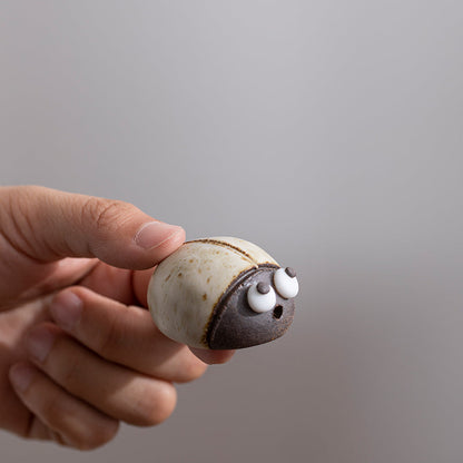 Mascottes de thé coccinelle marron