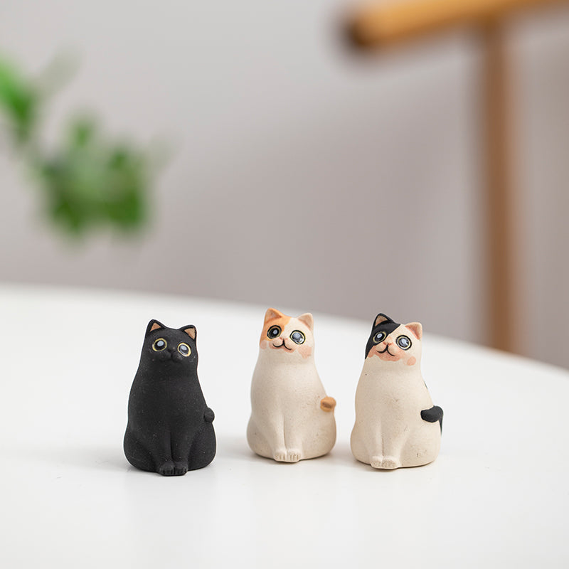 Mascottes de thé chat innocent