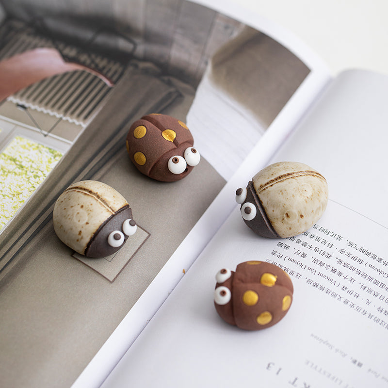 Mascottes de thé coccinelle marron