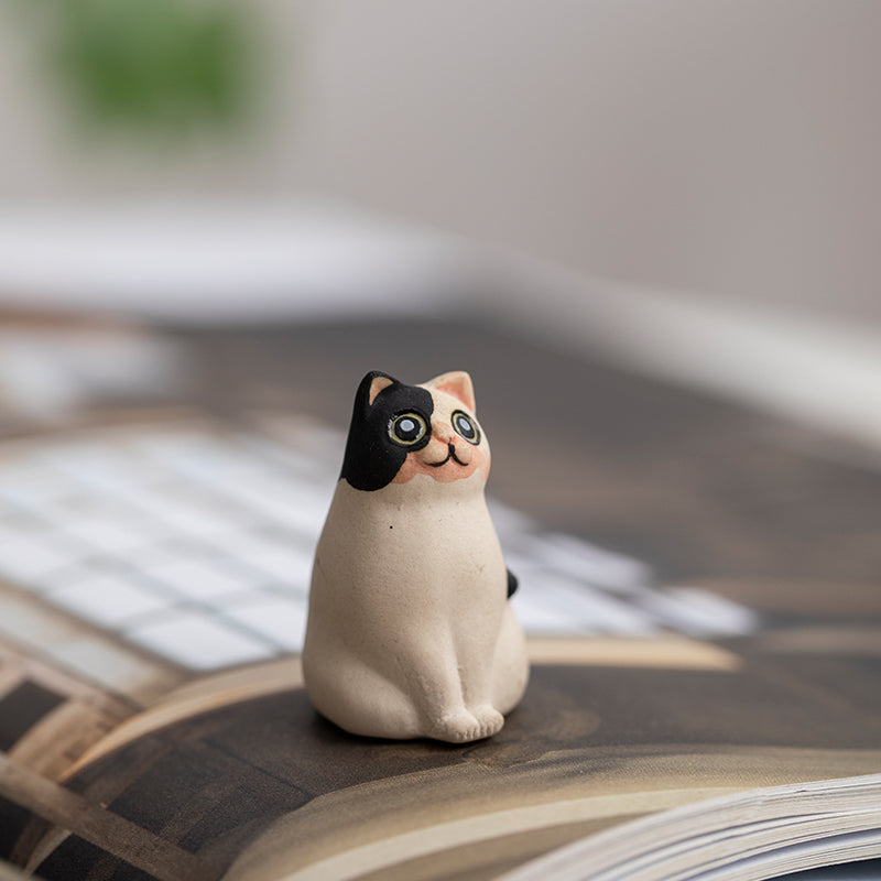 Mascottes de thé chat innocent