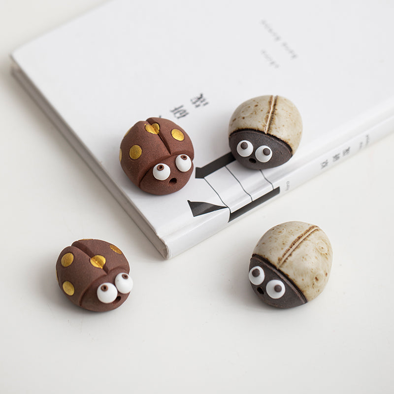Mascottes de thé coccinelle marron