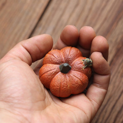 Mascottes de thé citrouille en argile