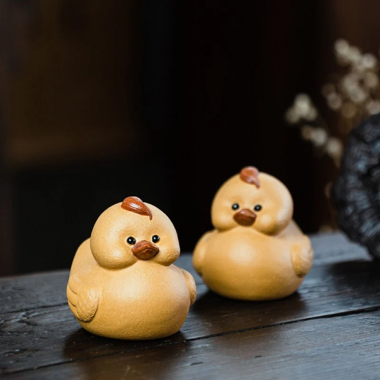 Mascotte de Thé Phénix Doré en Argile