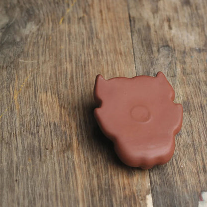 Mascottes de thé cochon en argile