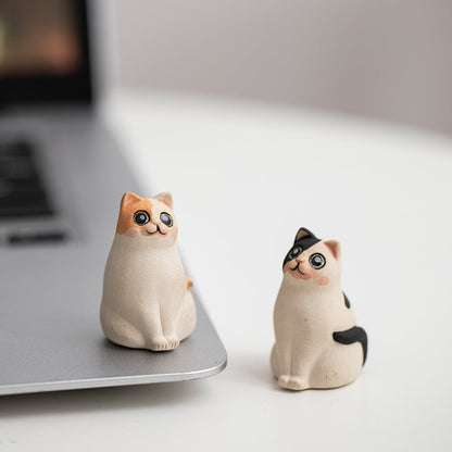Mascottes de thé chat innocent