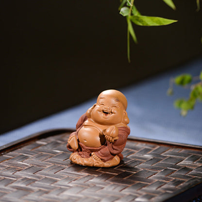 Mascottes de thé bébé zen en argile