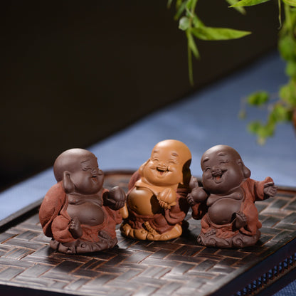 Mascottes de thé bébé zen en argile