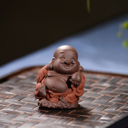 Mascottes de thé bébé zen en argile
