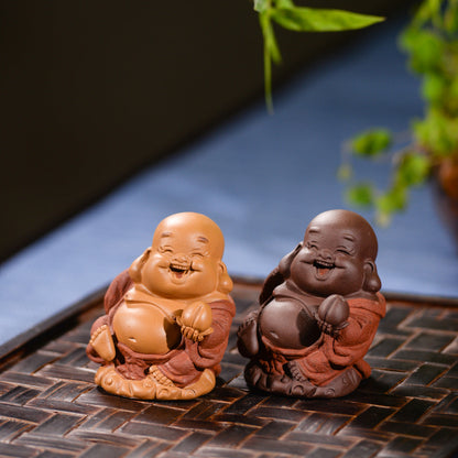 Mascottes de thé bébé zen en argile