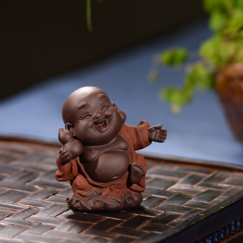 Mascottes de thé bébé zen en argile