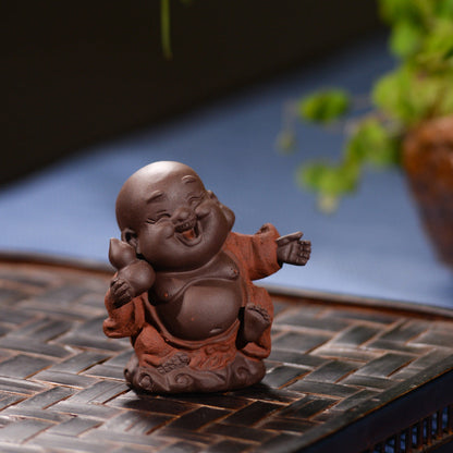 Mascottes de thé bébé zen en argile