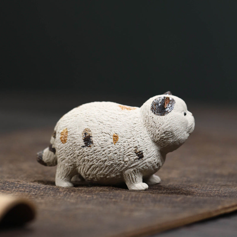 Mascottes de thé white chat en argile