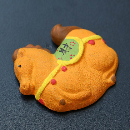 Mascottes de thé cheval orange en argile