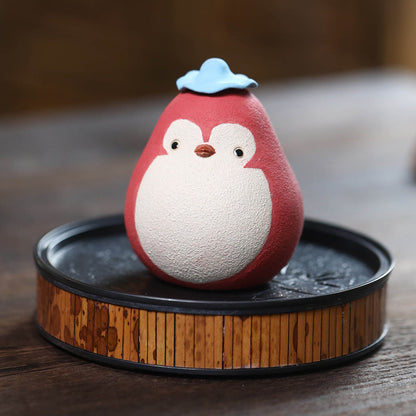 Mascottes de thé pinguin en argile