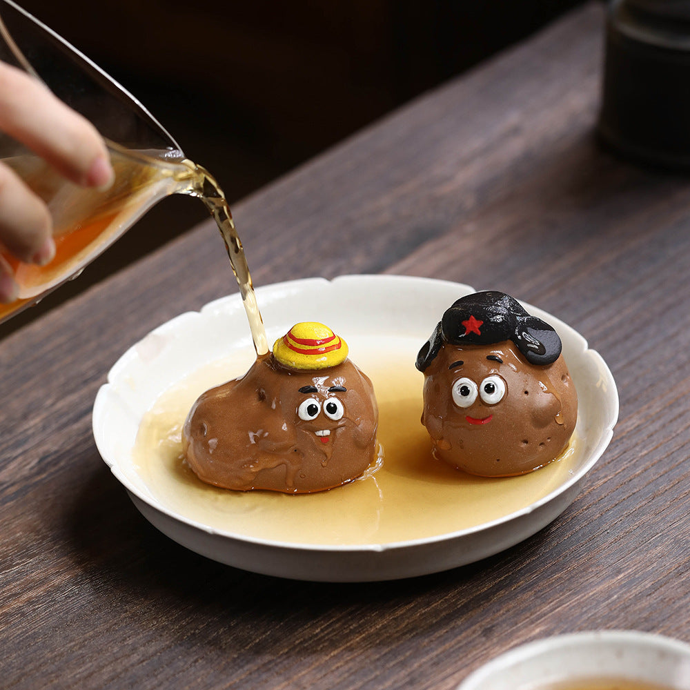 Mascottes de thé patate en argile