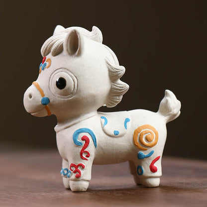 Mascottes de thé chevale blanc en argile