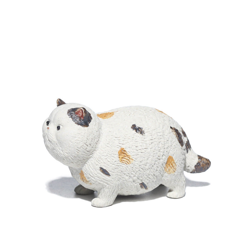 Mascottes de thé white chat en argile