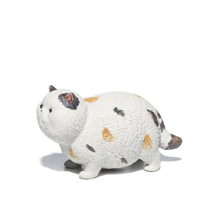 Mascottes de thé white chat en argile
