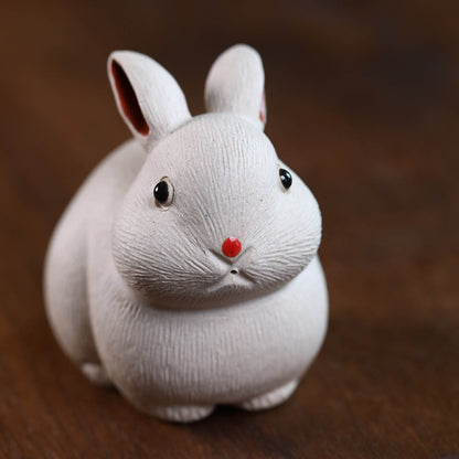 Mascottes de thé lapin blanc mignon en argile