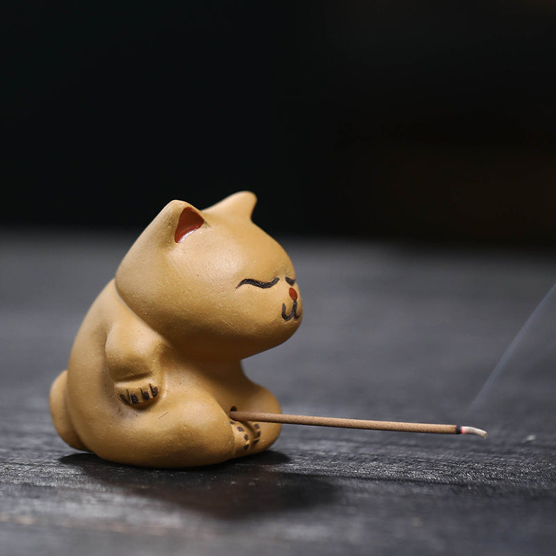 Mascottes de thé chat dormant en argile