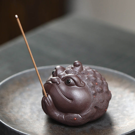 Mascottes de thé frog noir en argile