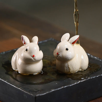 Mascottes de thé lapin blanc mignon en argile